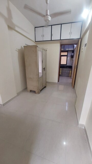 Room in 3 BHK Apartment at Om Sai Charan CHS, Borivali West – for Sale