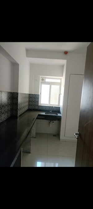 Kitchen in 2 BHK Apartment at Lodha Amara, Kolshet Road – for Sale
