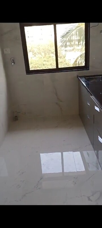 Kitchen in 1 BHK Apartment at Sudarsan Panchsheel, Andheri East – for Sale