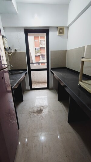 Kitchen in 1 BHK Apartment at Lodha Palava City Lakeshore Greens, Dombivli East – for Rent