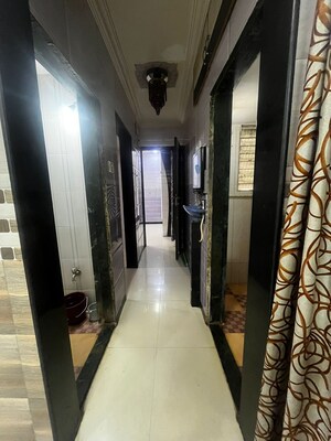 Building Lobby in 1 BHK Apartment at Nerul Sector 20 – for Rent