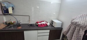 Kitchen in 2 BHK Apartment at Duville Riverdale Heights, Kharadi – for Rent