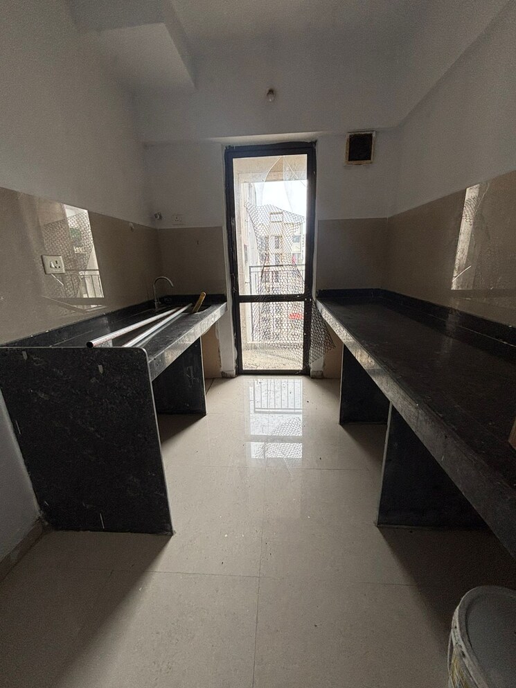 Kitchen, lodha-palava-city-lakeshore-greens 1 Bedroom 720 Sq.Ft. Apartment In Dombivli East Thane 9557425