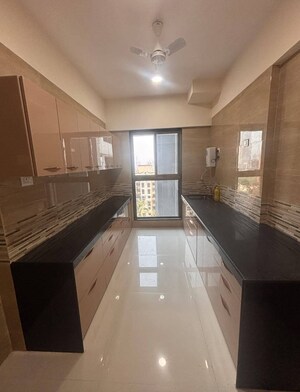 Kitchen in 2 BHK Apartment at Rajesh Raj Infinia, Malad West – for Rent