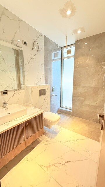 Bathroom in 4 BHK Builder Floor at Ansal API Esencia, Sector 67 – for Sale