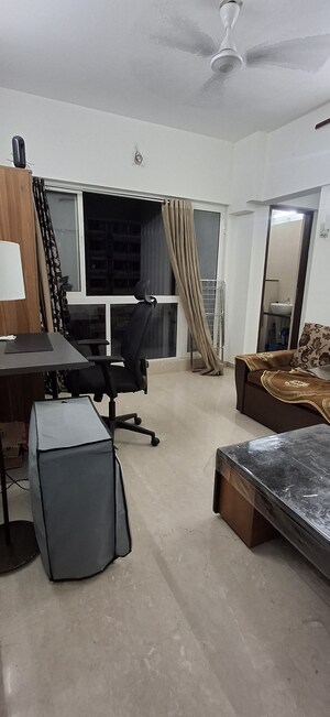 Team Area in 1 BHK Apartment at Omkar Signet, Malad East – for Rent