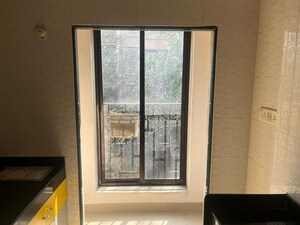 Room in 2 BHK Apartment at Shiv Prasad CHS Dahanukar Wadi, Kandivali West – for Sale