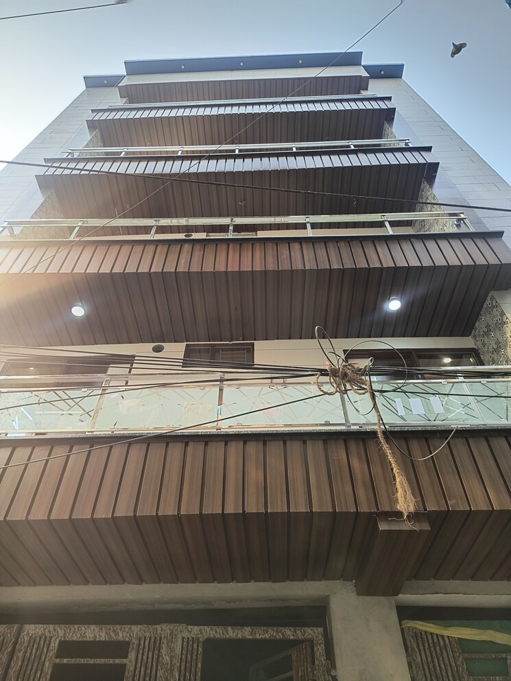 Exterior View, dwarka mor 3 Bedroom 100 Sq.Yd. Builder Floor In Dwarka Mor Delhi 9558086