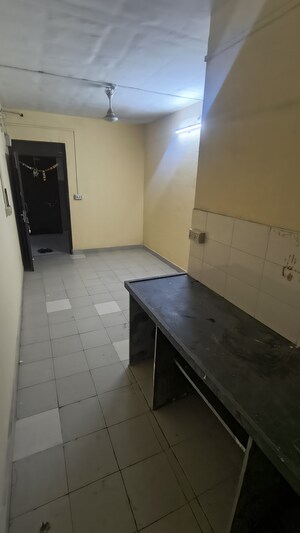 Kitchen in 2 BHK Apartment at Indiabulls Greens, New Panvel – for Rent