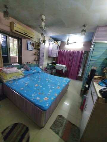 Bedroom in 2 BHK Apartment at Poonam Complex, Kandivali East – for Rent