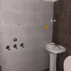Bathroom in 2.5 BHK Apartment at NK Sharma Savitry Greens 2, Ghazipur – for Rent