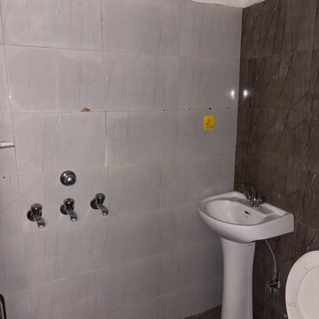 Bathroom in 2.5 BHK Apartment at NK Sharma Savitry Greens 2, Ghazipur – for Rent