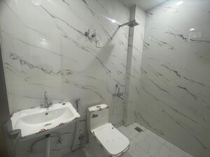 Bathroom in 4 BHK Builder Floor at Sector 1 Vaishali – for Rent