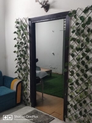 Living Room in 1 BHK Apartment at Noida Central – for Sale