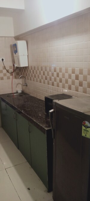 Kitchen in 2 BHK Apartment at Bindra Complex, Andheri East – for Rent