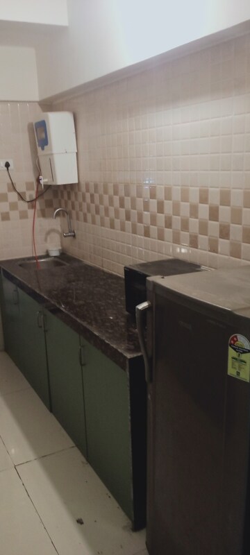 Kitchen in 2 BHK Apartment at Bindra Complex, Andheri East – for Rent