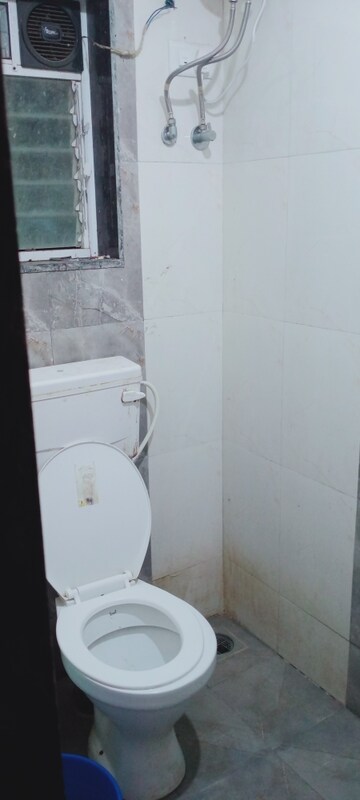 Bathroom in 2 BHK Apartment at Bindra Complex, Andheri East – for Rent