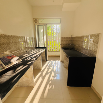 Kitchen in 1 BHK Apartment at Lodha Codename Premier, Mangaon – for Sale
