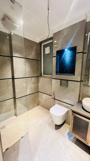 Bathroom in 4 BHK Builder Floor at Ansal API Esencia, Sector 67 – for Sale