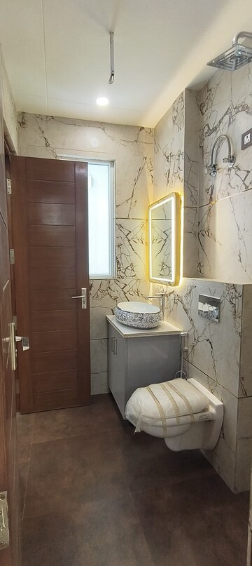 Bathroom in 4 BHK Builder Floor at Ansal API Esencia, Sector 67 – for Sale
