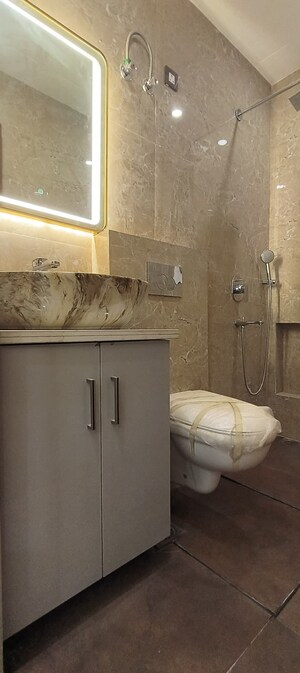 Bathroom in 4 BHK Builder Floor at Ansal API Esencia, Sector 67 – for Sale