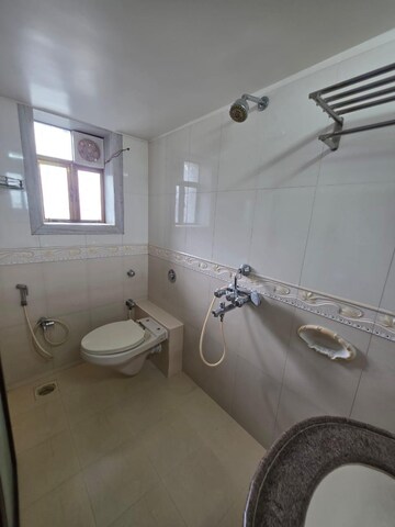 Bathroom in 1 BHK Apartment at Omkar Signet, Malad East – for Rent