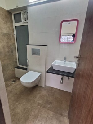 Bathroom in 1 BHK Apartment at Omkar Signet, Malad East – for Rent