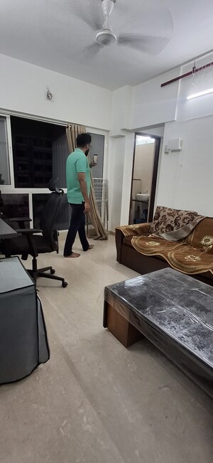 Living Room in 1 BHK Apartment at Omkar Signet, Malad East – for Sale