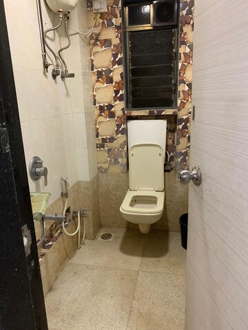Bathroom in  Shop at Axiom Girdhar Apartment, Borivali West – for Rent