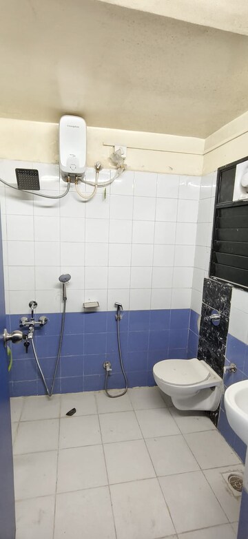 Bathroom in 2 BHK Apartment at Wadgaon Sheri – for Rent