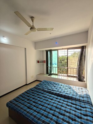 Bedroom in 2 BHK Apartment at Blue Mountains, Malad East – for Rent