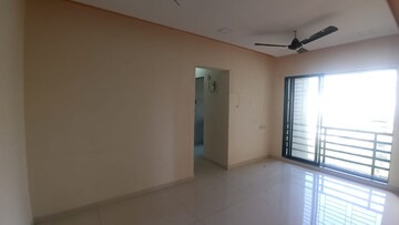 Living Room in 1 BHK Apartment at RNA NG Canary, Mira Road – for Sale