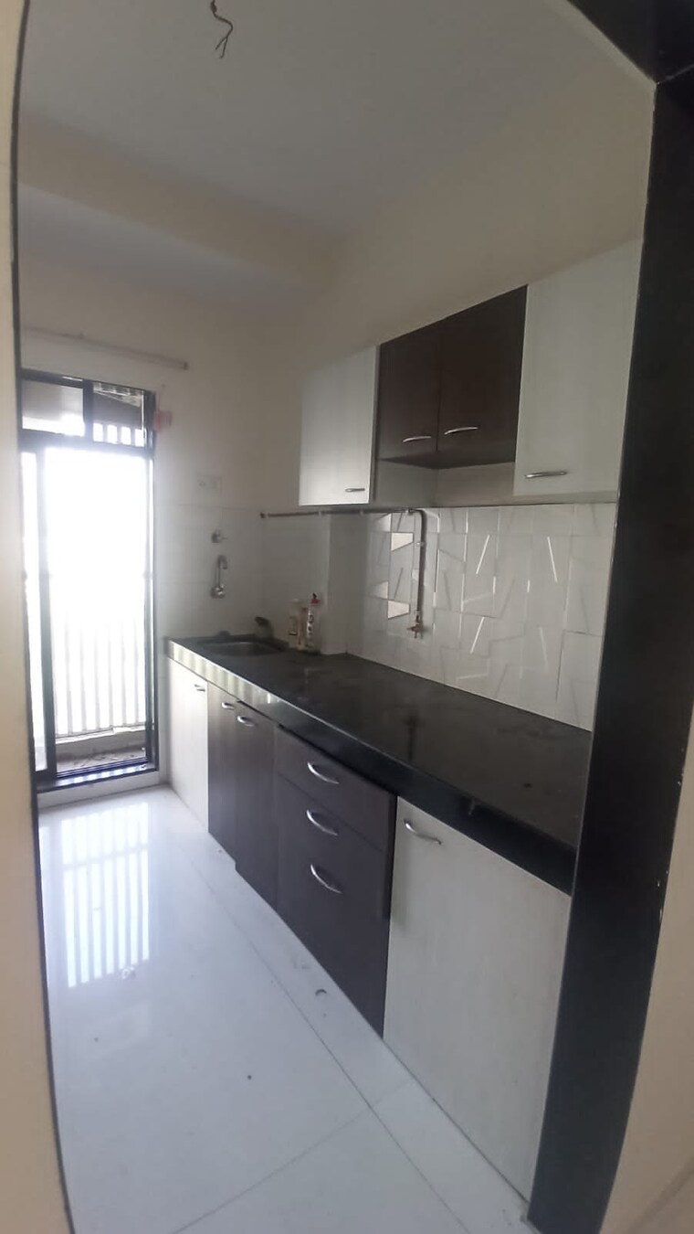 Kitchen, rna-ng-canary 1 Bedroom 600 Sq.Ft. Apartment In Mira Road Thane 9558466