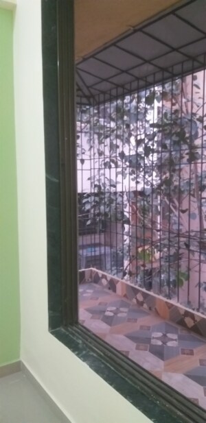 Balcony in 1 BHK Apartment at Cosmos Merry Park, Khopat – for Rent