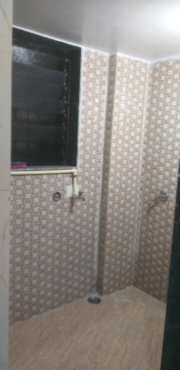 Bathroom in 1 BHK Apartment at Cosmos Merry Park, Khopat – for Rent