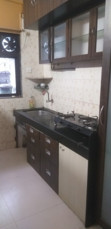 Kitchen in 1 BHK Apartment at Shaligram CHS, Azad Nagar – for Rent