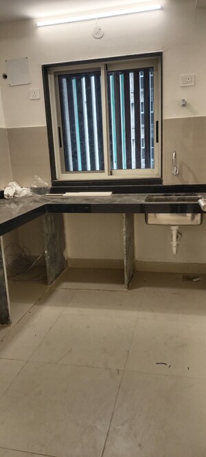 Kitchen in 2 BHK Apartment at Worli Sneha CHS, Worli – for Rent