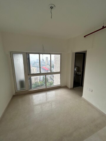 Living Room in 1 BHK Apartment at Omkar Signet, Malad East – for Rent