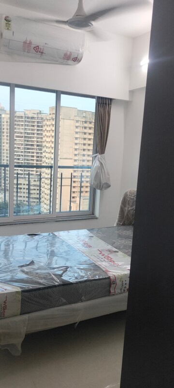 Master Bedroom in 1 BHK Apartment at Dimple 19 North, Kandivali West – for Rent
