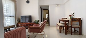 Living Room in 1.5 BHK Apartment at Lodha Palava Downtown, Dombivli East – for Sale
