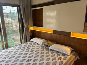 Bedroom in 3 BHK Apartment at Bajaj Jayshree CHS, Vile Parle West – for Rent
