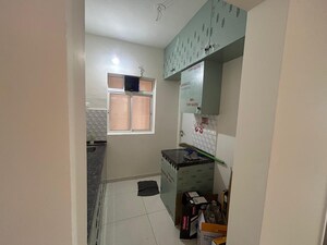 Team Area in 1 BHK Apartment at Godrej Green Vistas, Mahalunge – for Rent