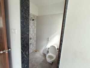 Bathroom in 2.5 BHK Apartment at Porwal Parklane Urbanjoy, Sus – for Rent