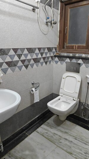 Bathroom in 1 BHK Apartment at Paryavaran Complex – for Rent