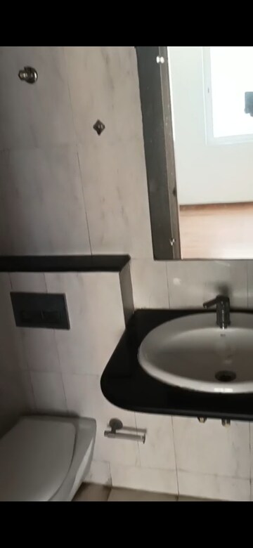 Bathroom in 2 BHK Apartment at Raheja Vedaanta, Sector 108 – for Rent
