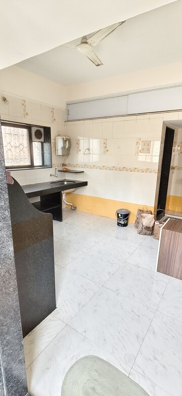Kitchen in 1 RK Apartment at Wadgaon Sheri – for Rent