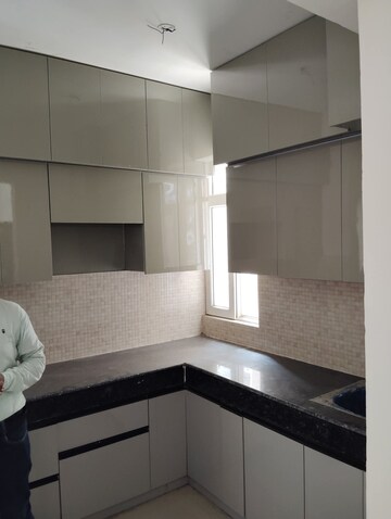 Kitchen in 2 BHK Apartment at JNC The Park, Sector 16c Greater Noida – for Rent