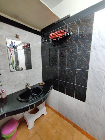 Bathroom in 1 BHK Apartment at Sukh Angan CHS, Nalasopara West – for Sale