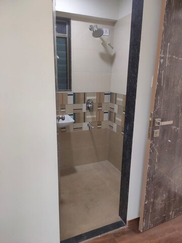 Bathroom in 1 BHK Apartment at Bindra Sateri Legacy, Andheri East – for Sale