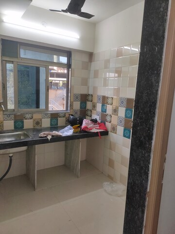 Kitchen in 1 BHK Apartment at Bindra Sateri Legacy, Andheri East – for Sale